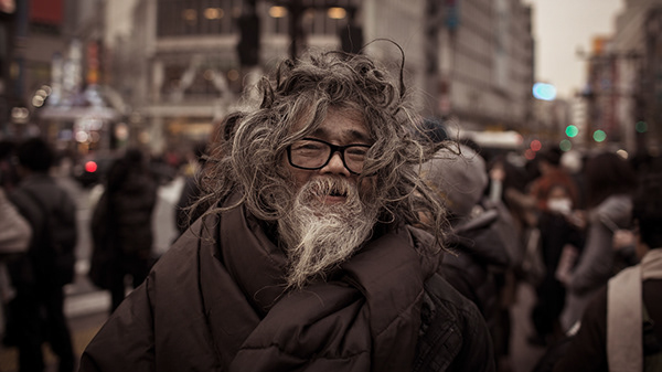Street portrait of a homeless man in Shibuya. Tokyo, Japan